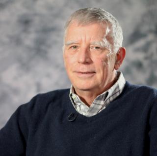 John Joseph Wallis, Mancur Olson Professor of Economics